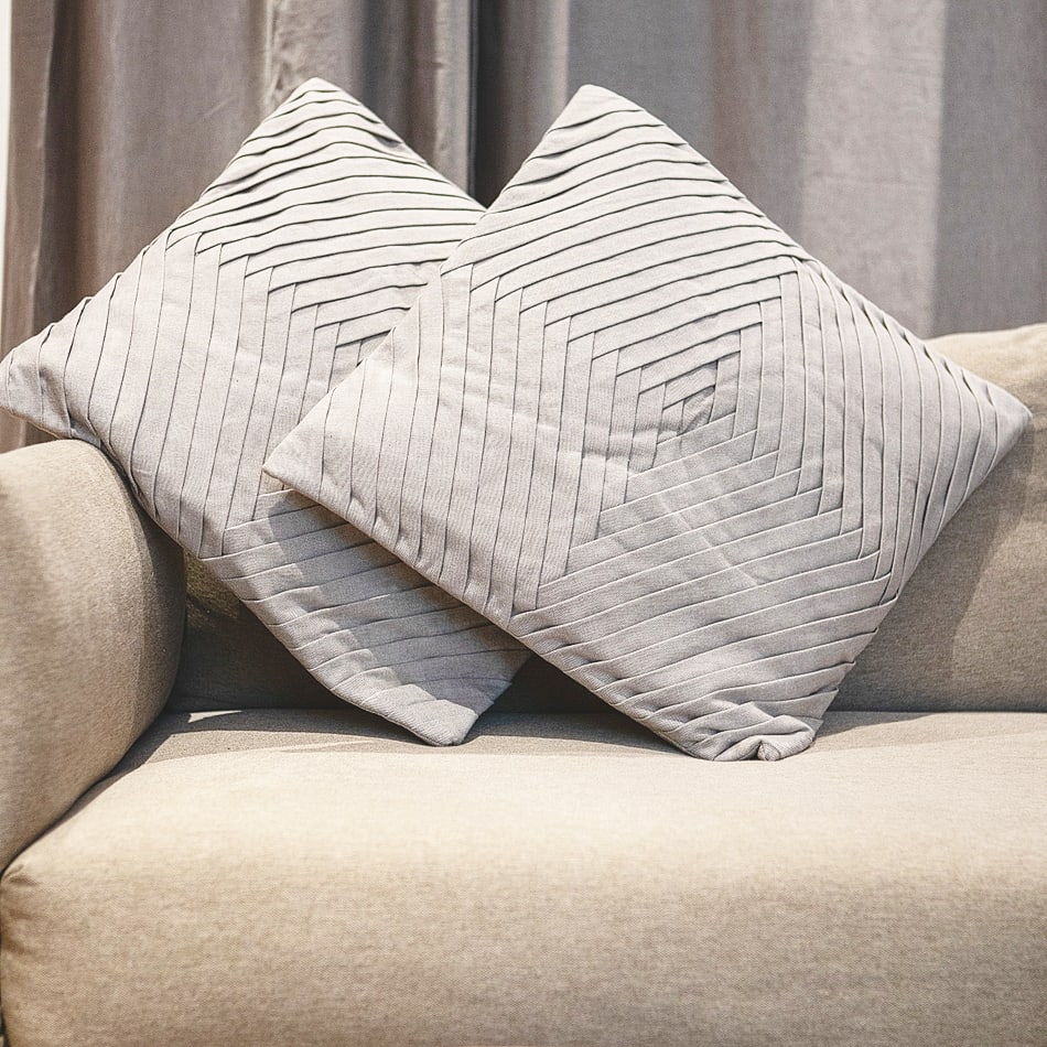 Pleated cotton cushion covers are a stylish and functional addition to any home decor.