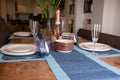 Luxury cotton blue placemats on the dinning table 