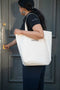 Organic cotton shopping bag of Karpasa London carried by a women